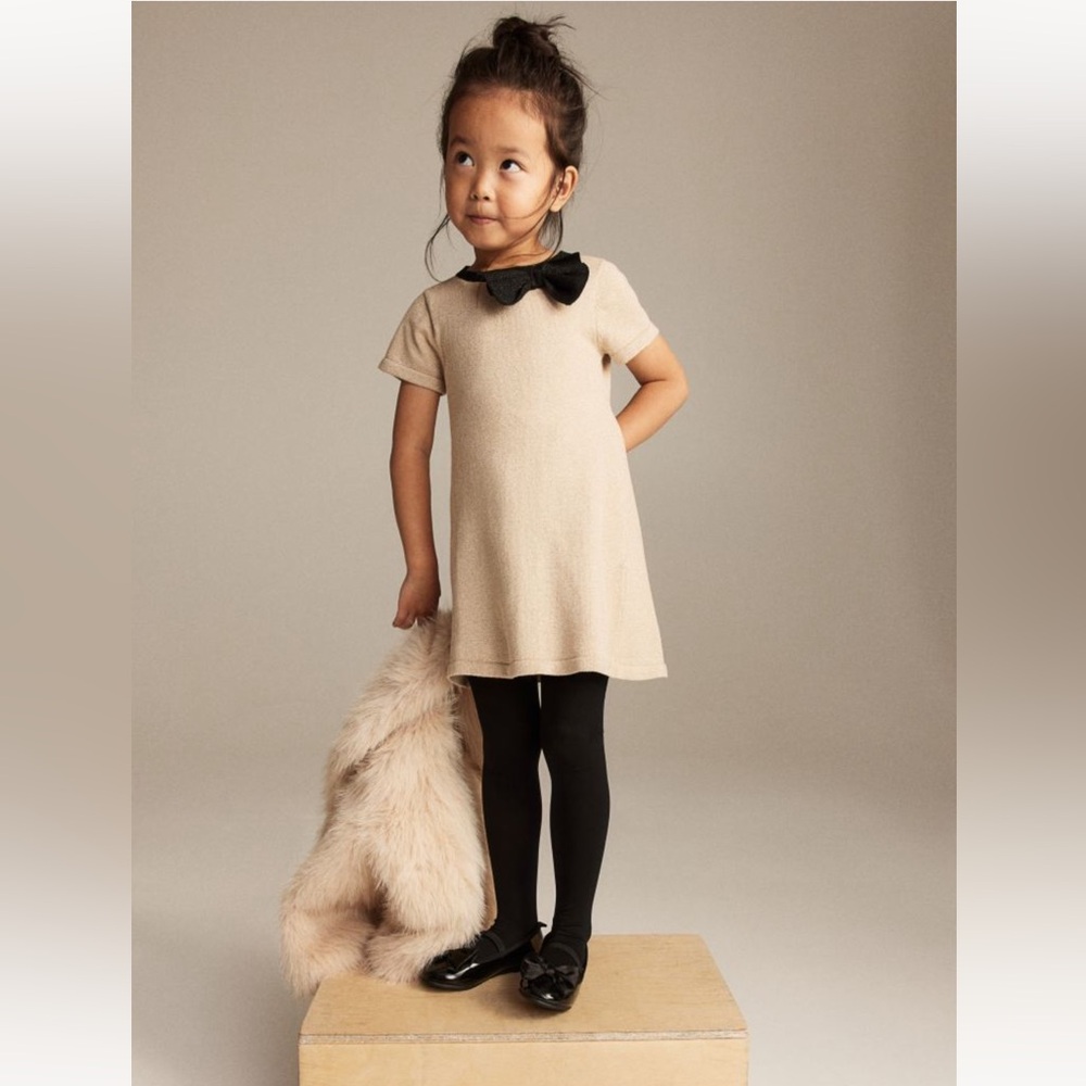 Glittery Gold Dress with Black Bow